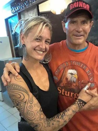 Ubud, Indonesia with artist tattooed arm