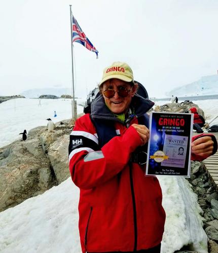 About to do GRINGO book signing in Penguin colony in Anartctica. Gringo cap, British Flag