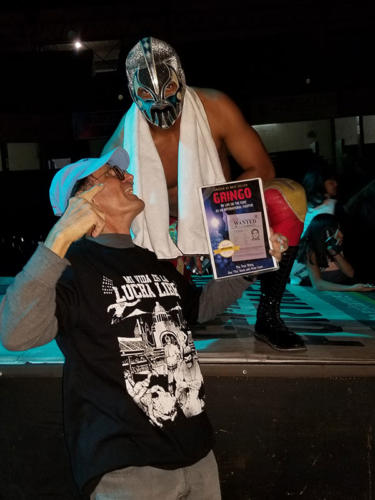 Dan Tito Davis Book Pimping at a professional wrestling match in Guadalajara, Mexico